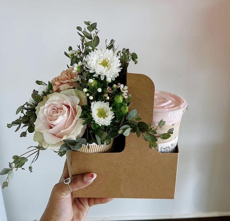 Cup o flowers.