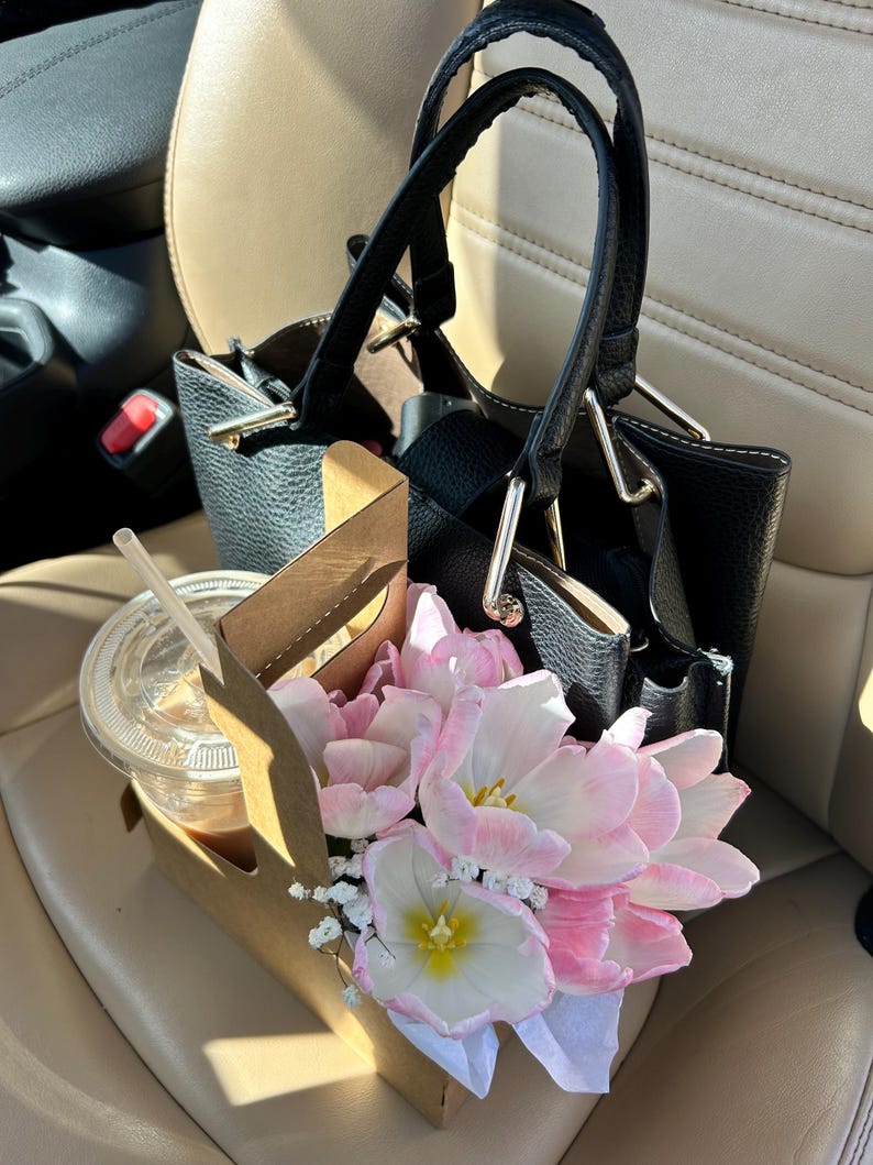 Cup o flowers.